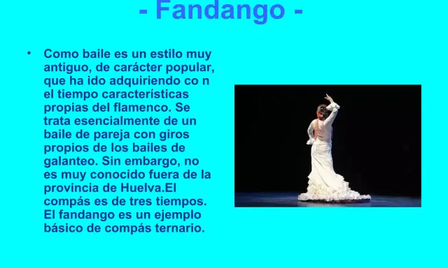 Bailarina de flamenco con vestido blanco, moviendo los brazos al ritmo de las bulerías.